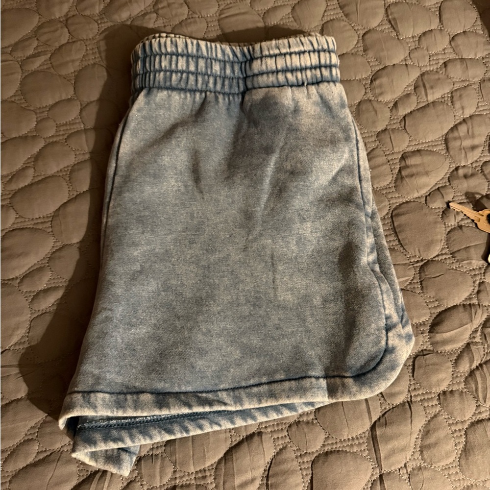 New never worn. Zenana dolphin hem shorts.
